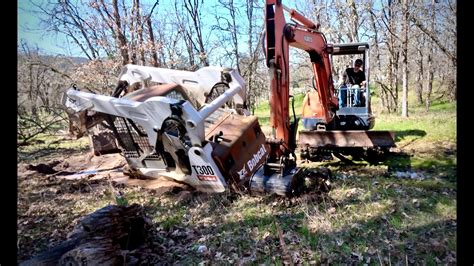 getting skid steer stuck to get out of work|skid steer stuck in dirt.